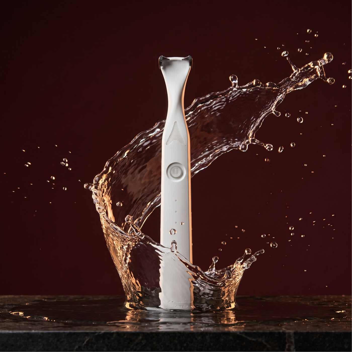 The flosser in a splash of water